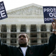 Protester in front of the Supreme Court as the court hears oral arguments in McCutcheon v. Federal Election Commission Oct. 8, 2013
DREW ANGERER/GETTY IMAGES